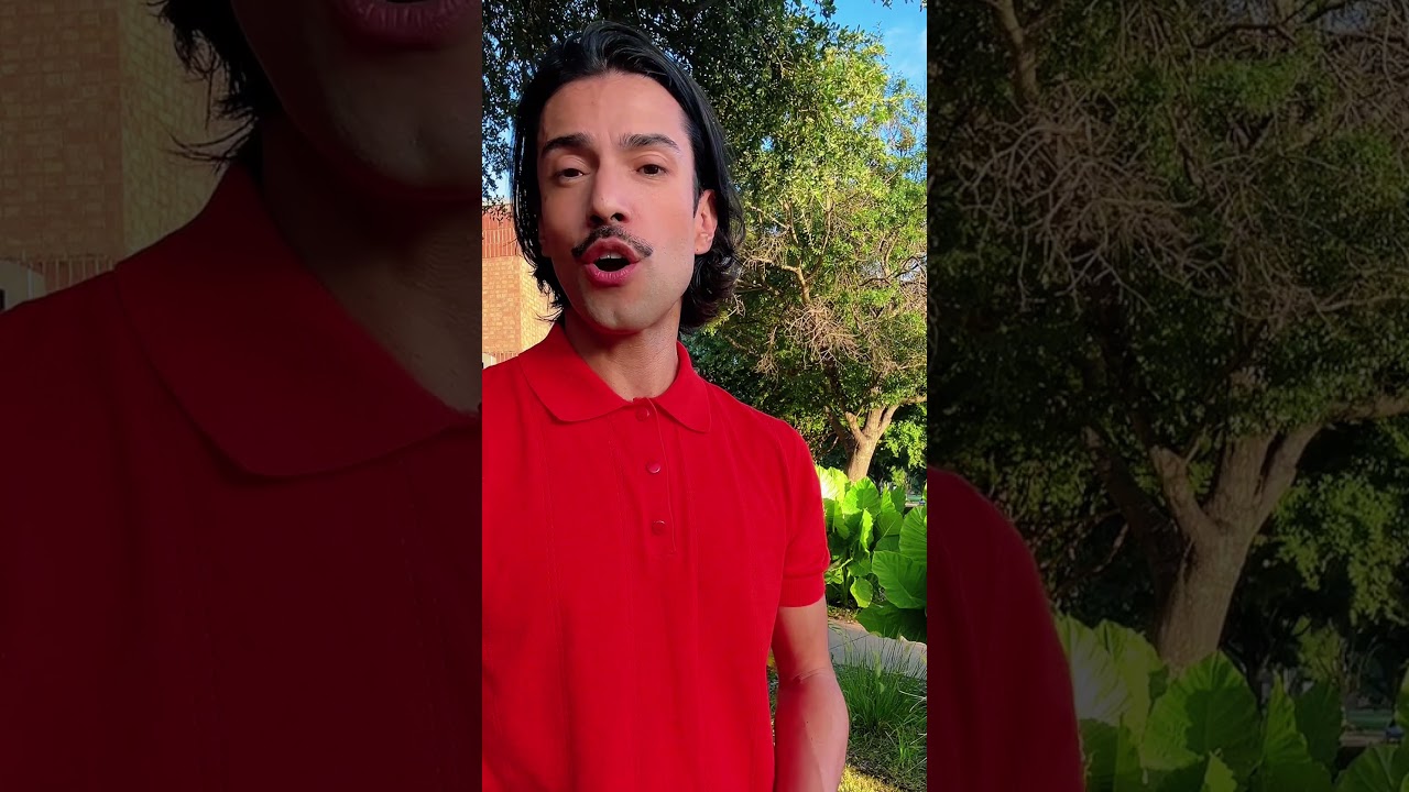 JohnRoss in a red polo standing outdoors with greenery, explaining how natural textures in interior design create calming, soulful, sensory home environments.